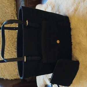 Two piece Michael kors tote with matching wristlet.